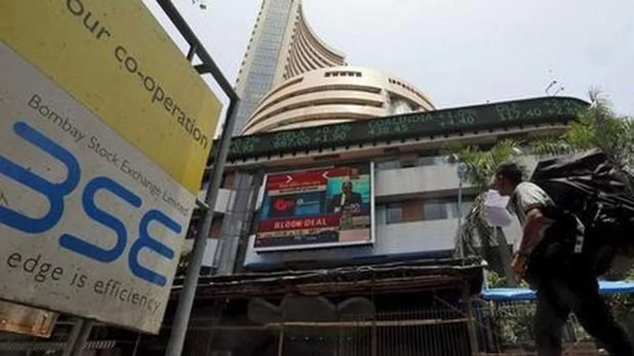 Sensex closes 263 points higher, Nifty reclaims 11,000