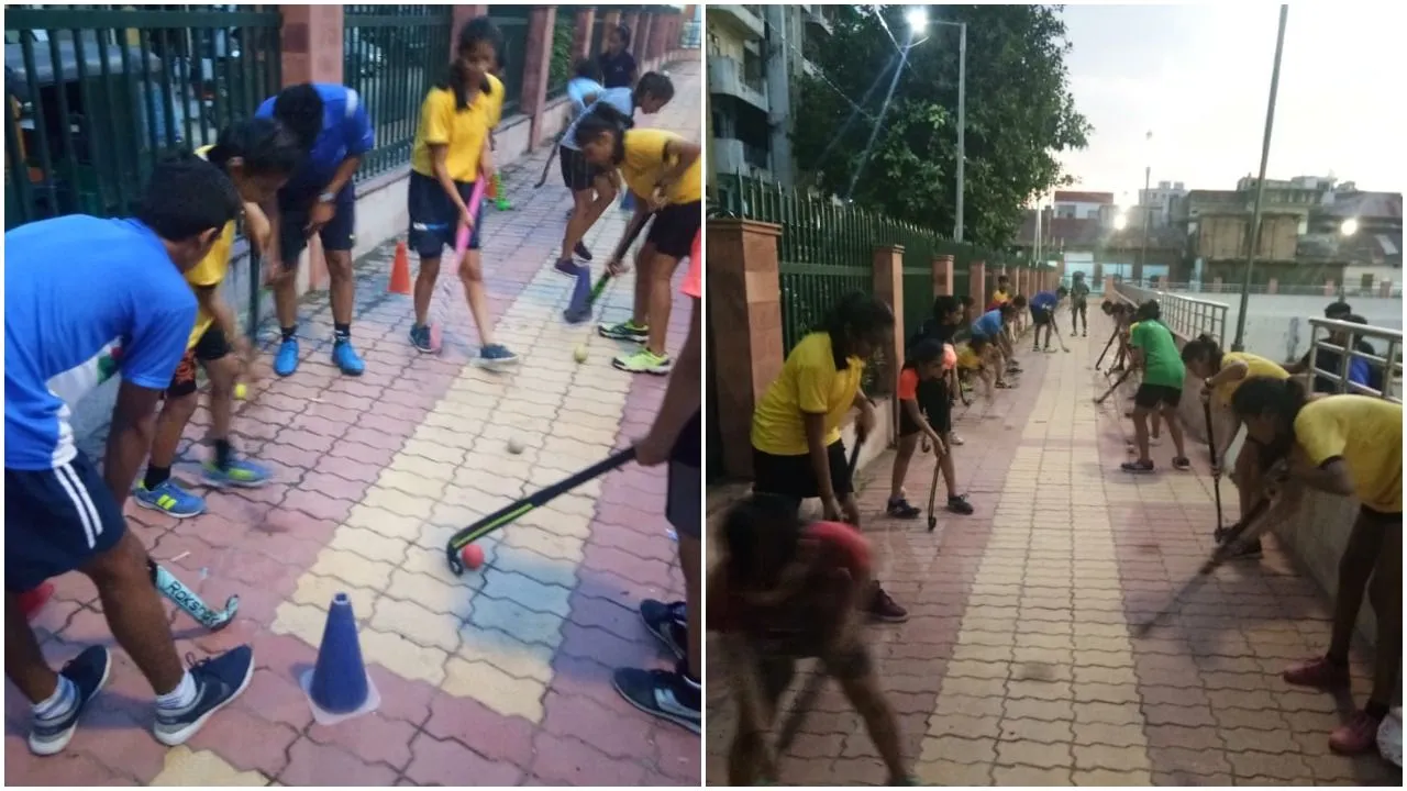 Hockey players from Vadodara practice on roadside walking track