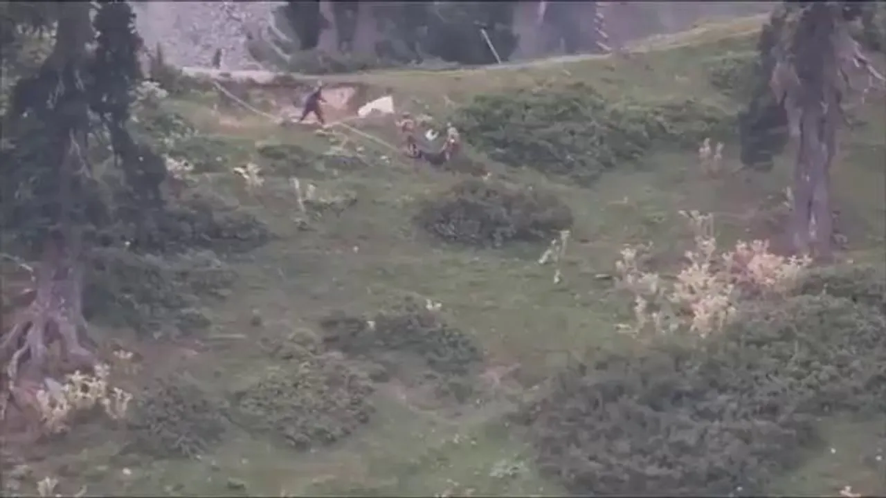Pakistani Army waves white flag and recovered bodies of  their two soldiers killed in cross-border firing