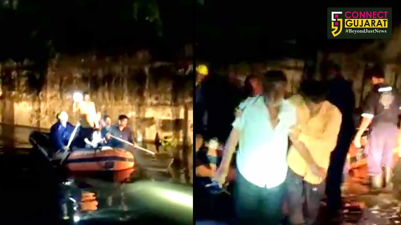 Vadodara fire brigade team rescued two persons stuck in rain water at Ranoli underpass