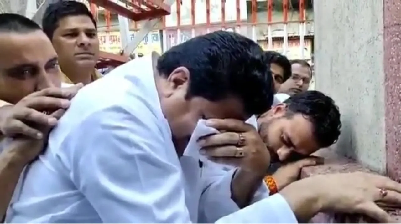 SP leader trolled for ‘Crying’ in front of Gandhi statue in UP