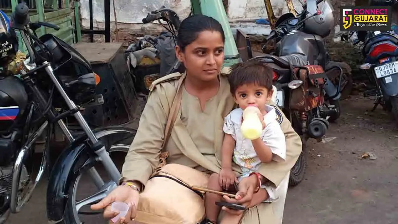 Woman constable in Vadodara seen performing her duty alongside her son