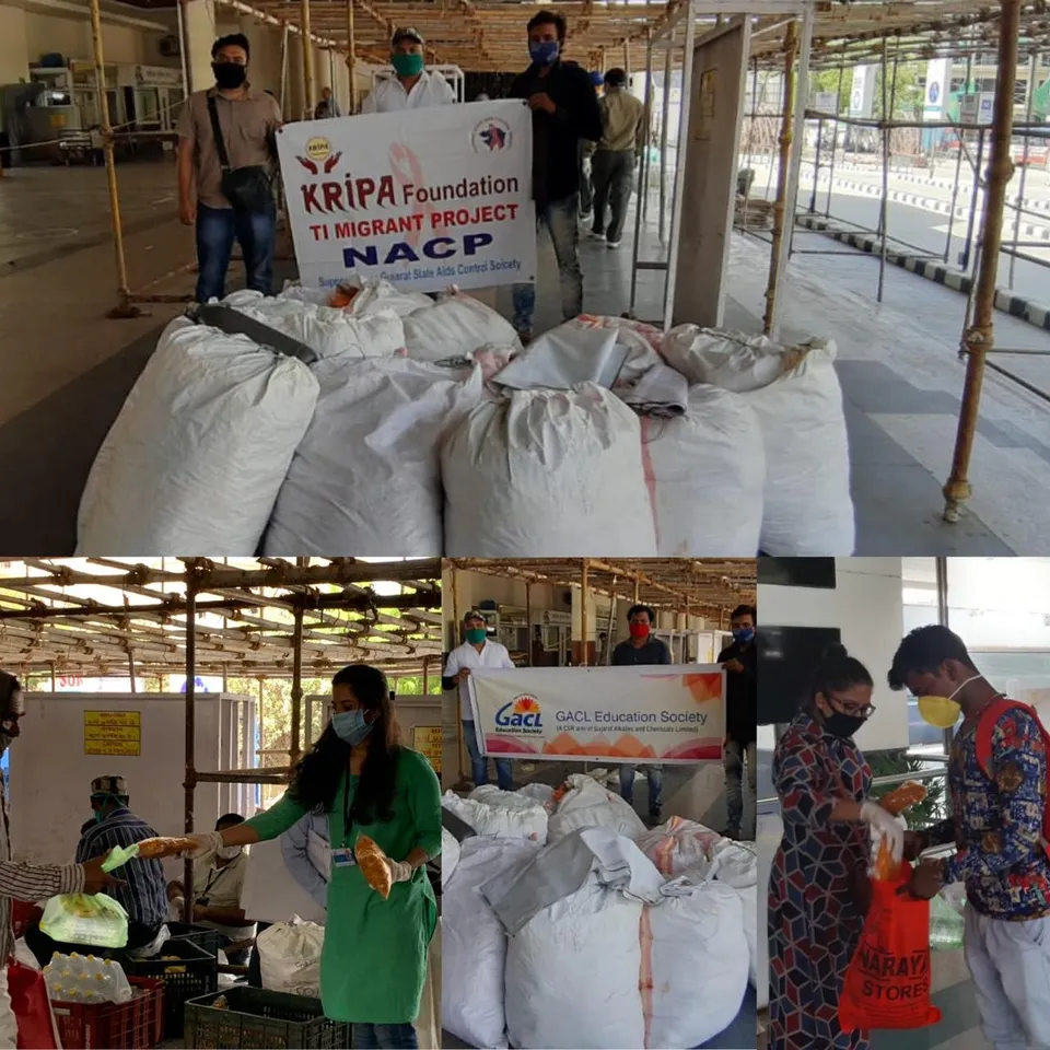 Kripa foundation with GACL distributed food packets to migrant labourers at railway station