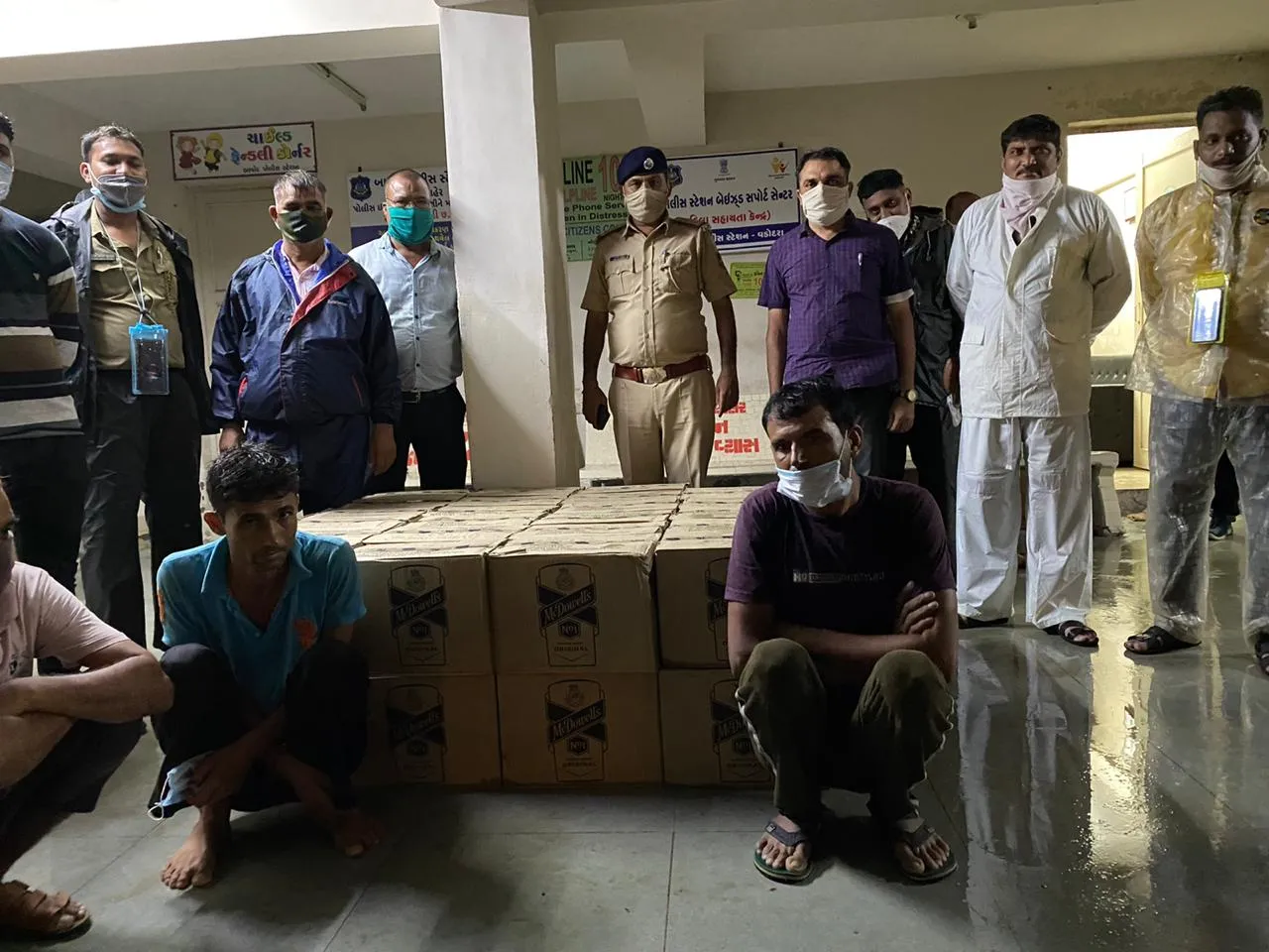 Bapod Police caught IMFL hidden inside a container at APMC Fruit Market