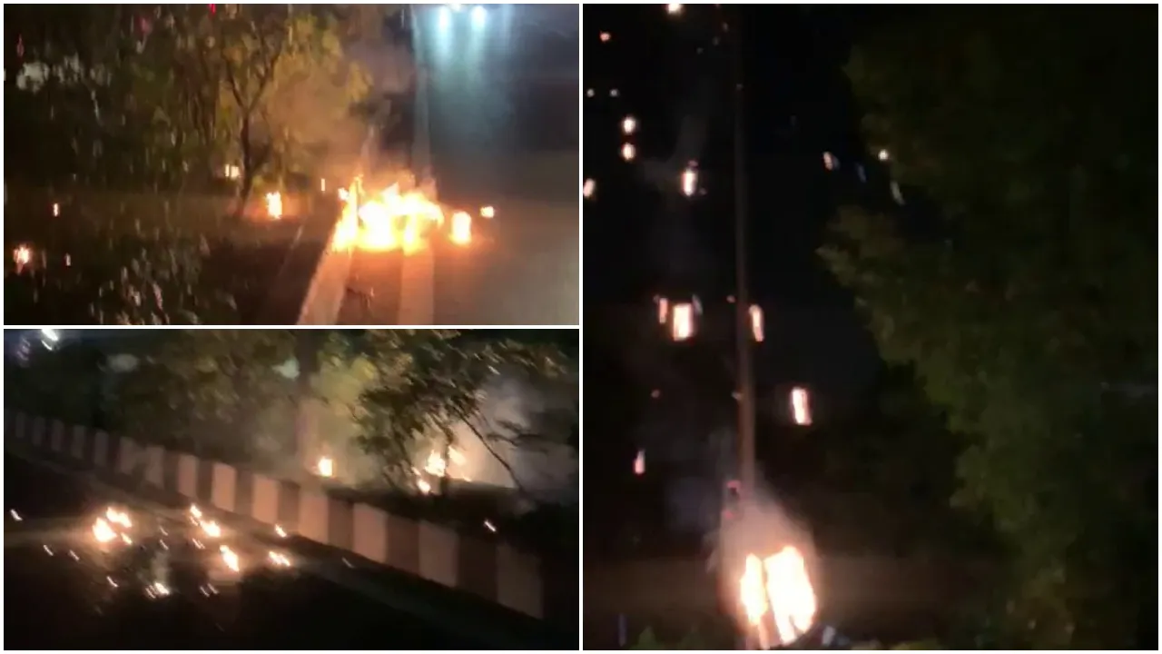 Burning lamp of street light pole fell on jail road in Vadodara