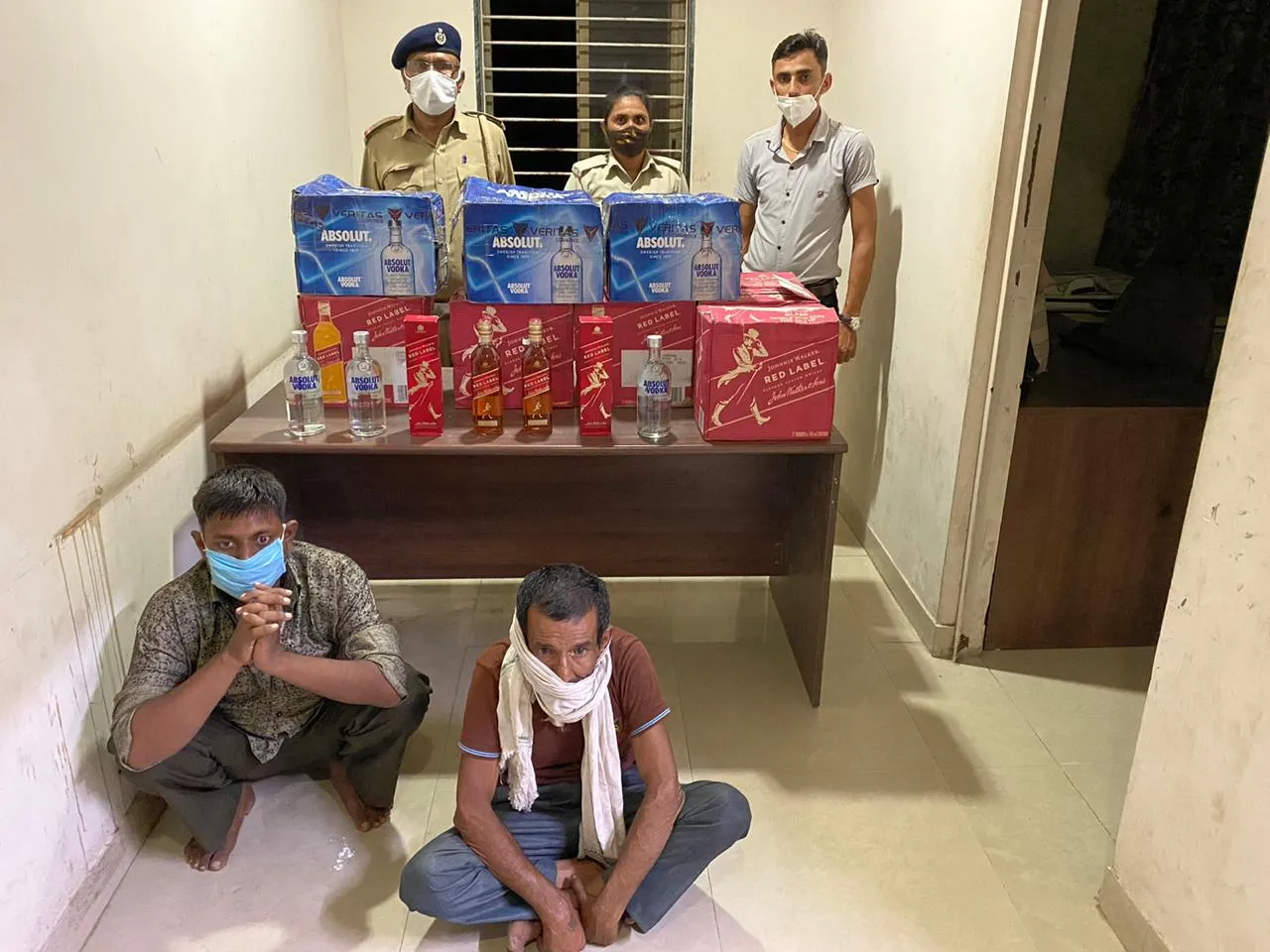 Bapod police arrested two with IMFL worth 2.95 lakhs hidden inside a container