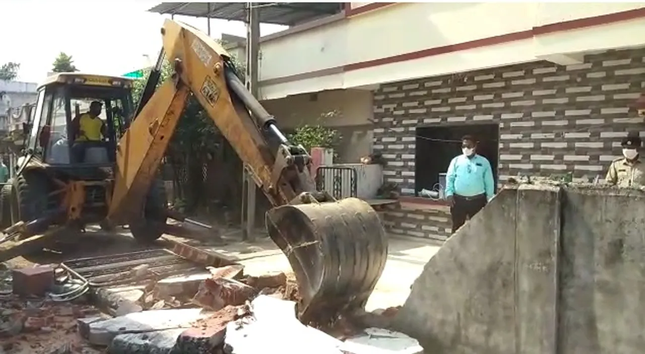 VMC anti encroachment team remove illegal structures in different parts of the city