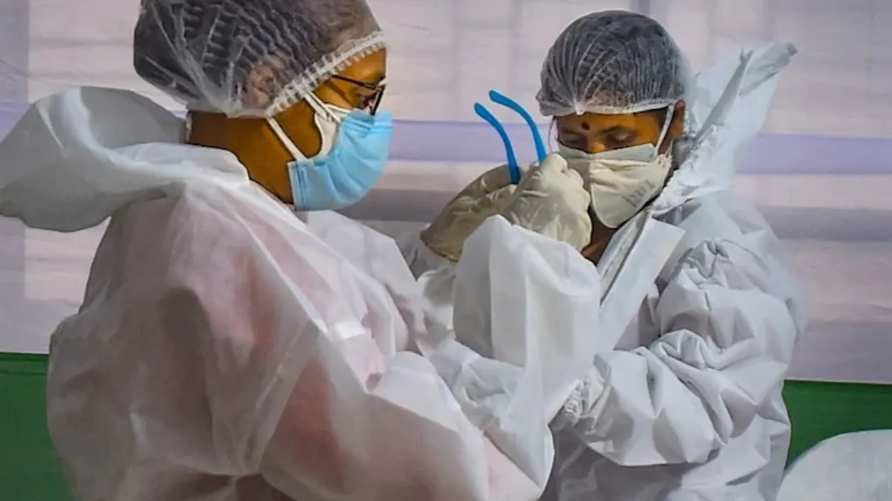 India reports 13,052 new COVID-19 cases