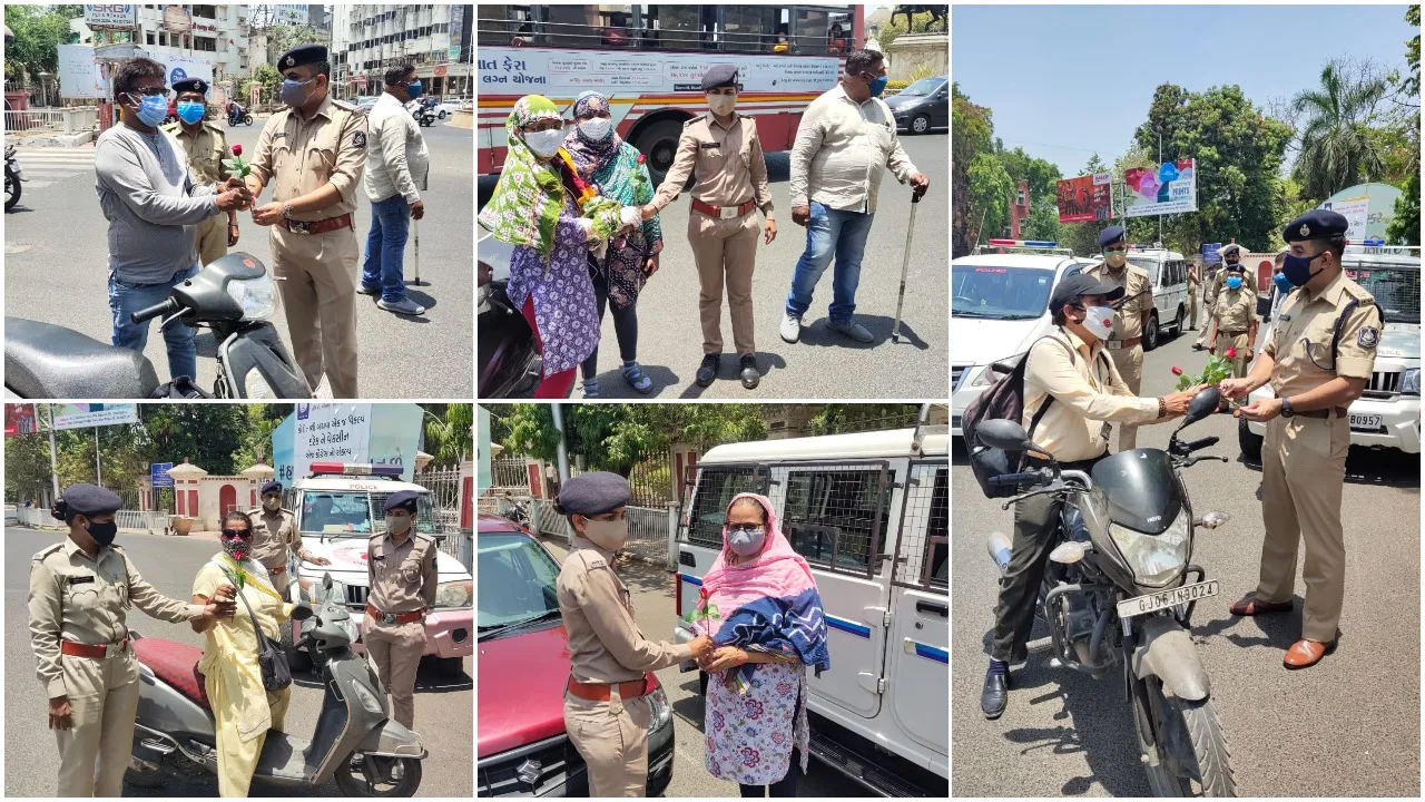 Vadodara police honoured people wearing double mask with a rose