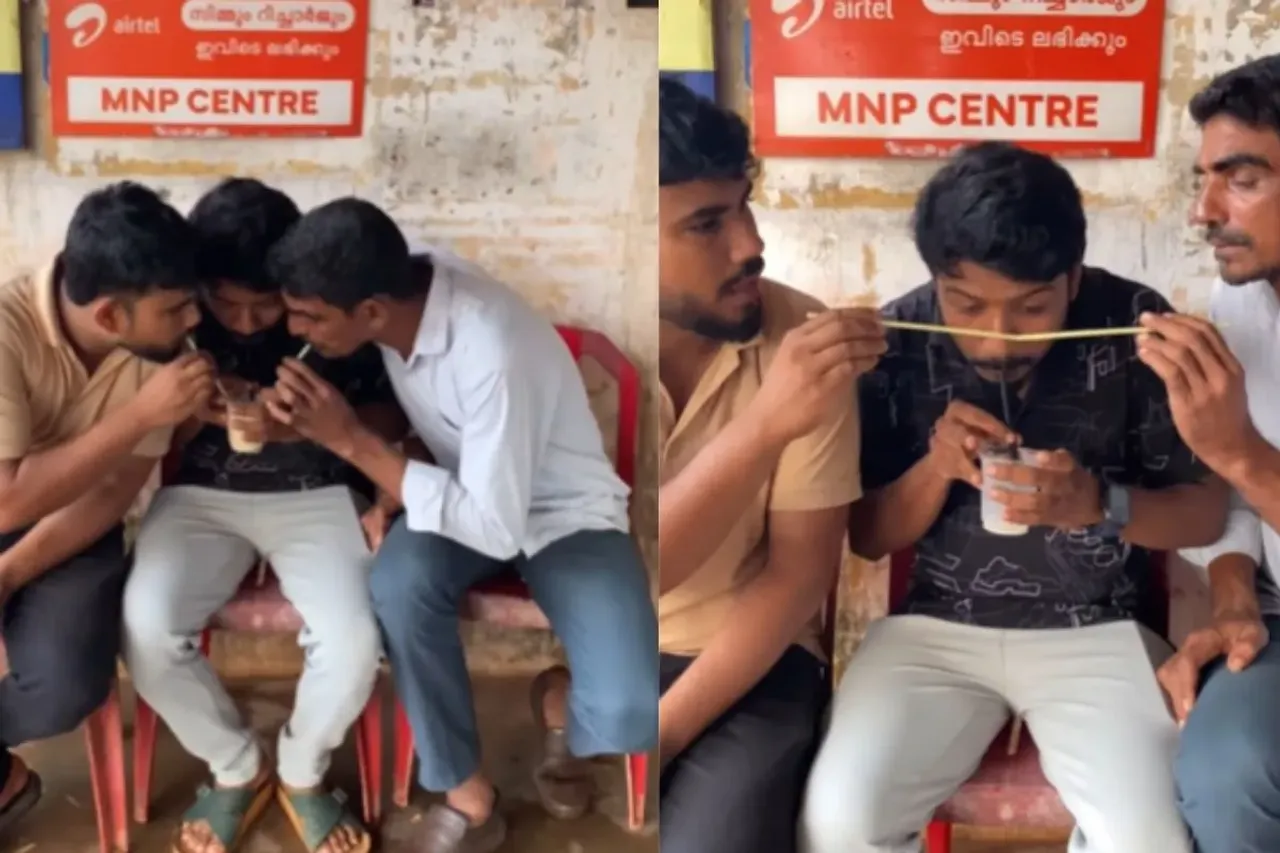 Friends sucking juice in the same glass