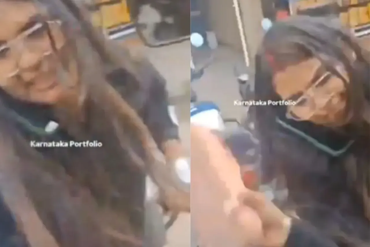 Woman beating auto driver with her slipper