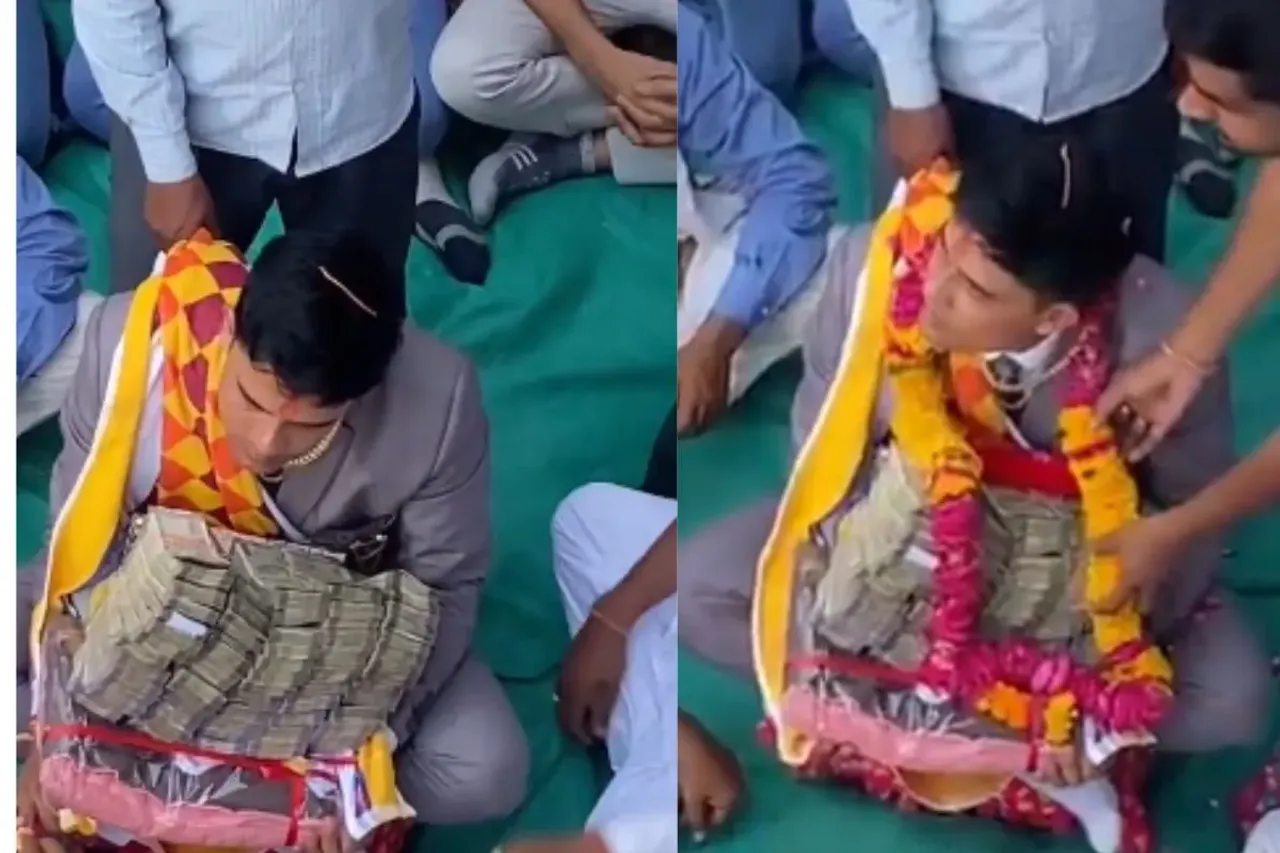 Groom being offered a wad of cash