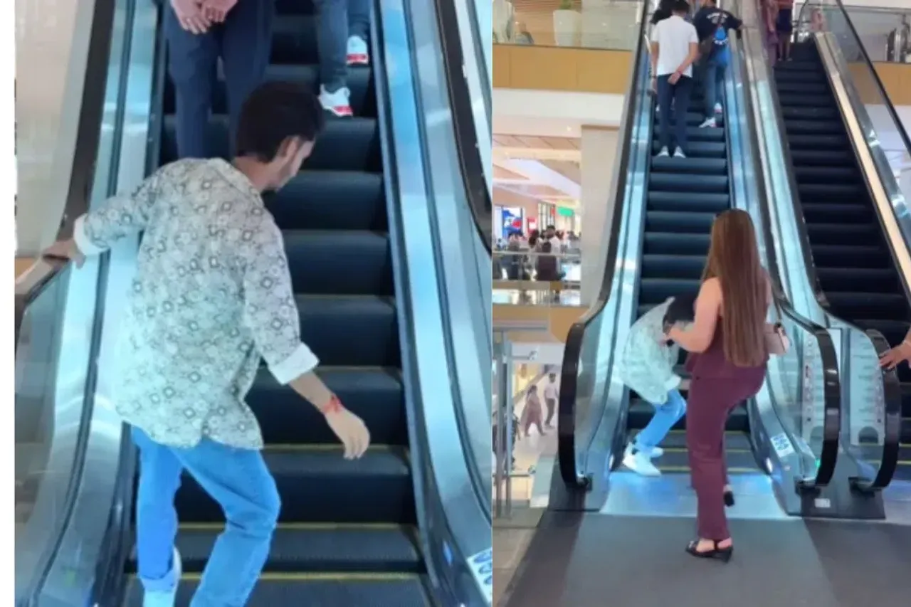 A girl hitting boy with her legs  on an escalator