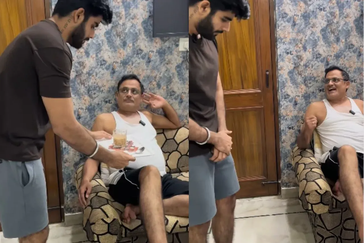 Son bringing tea to his father