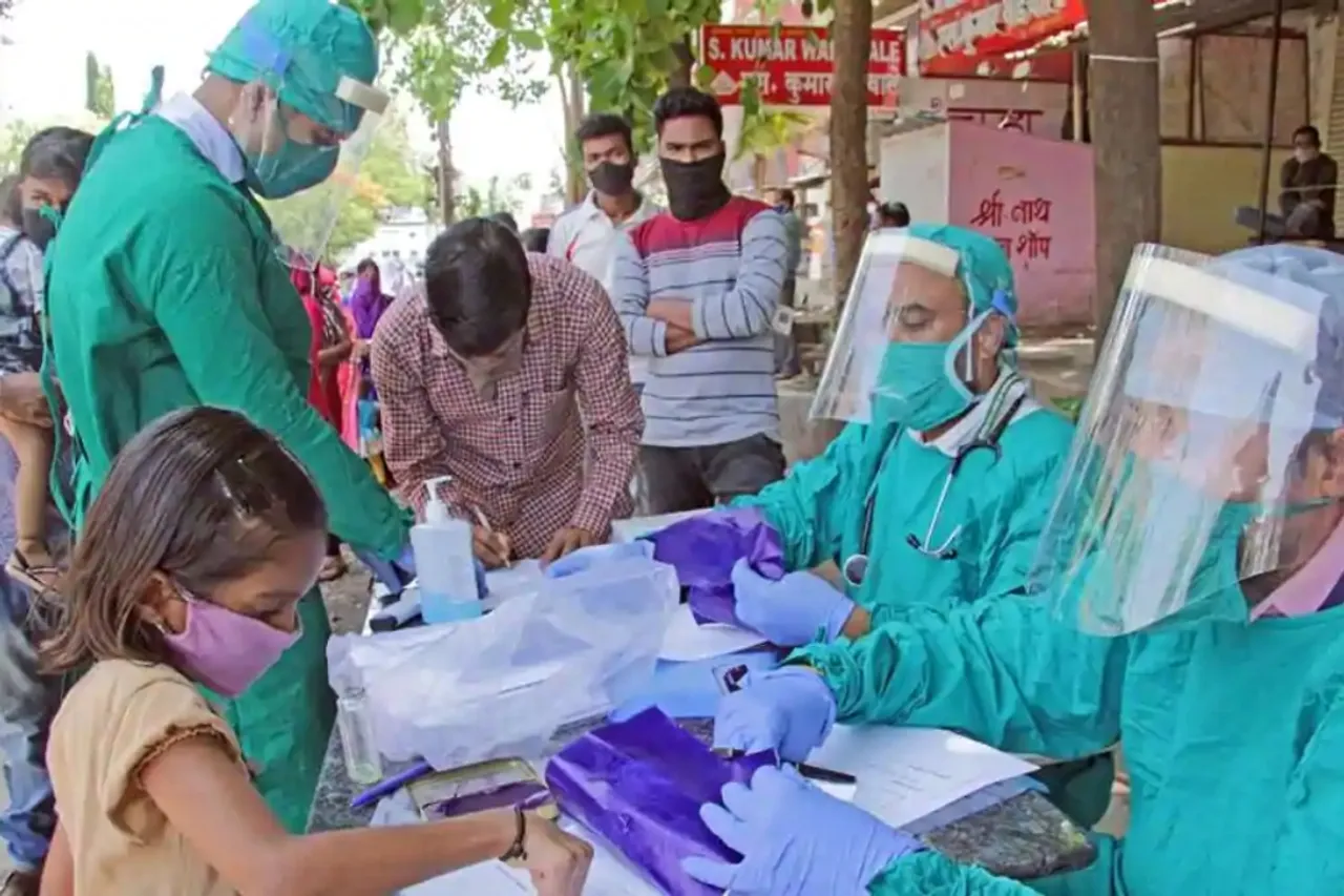 Covid-19 update: India logs in 50,210 new cases, 720 deaths