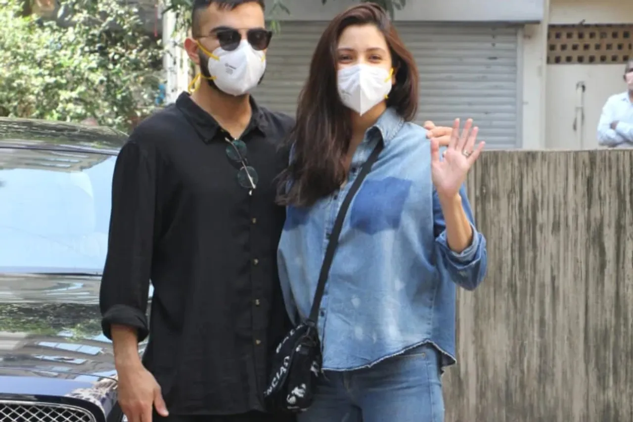 New Parents Anushka Sharma and Virat Kohli pose for shutterbugs in Mumbai, see pics