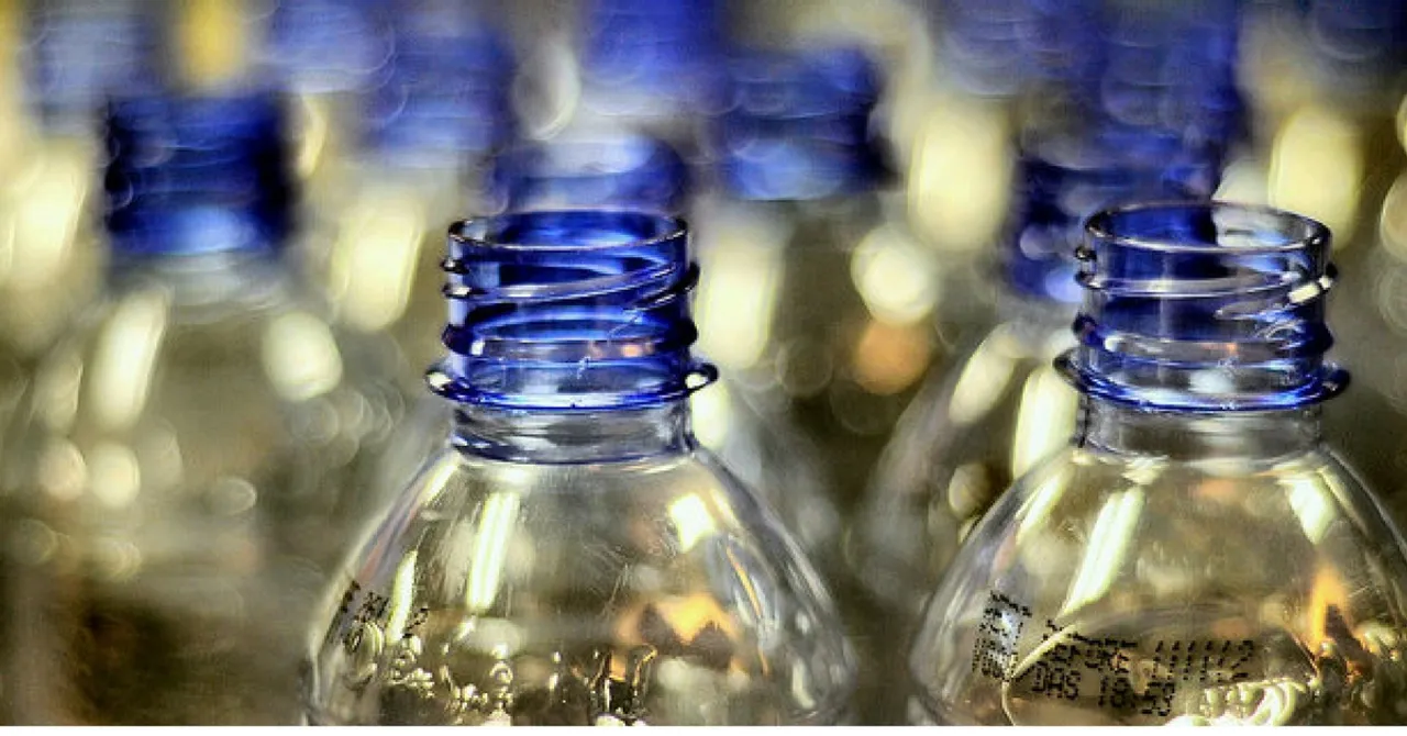 Empty Bottles in a Train? This Artist Is Making Art out of Your Trash