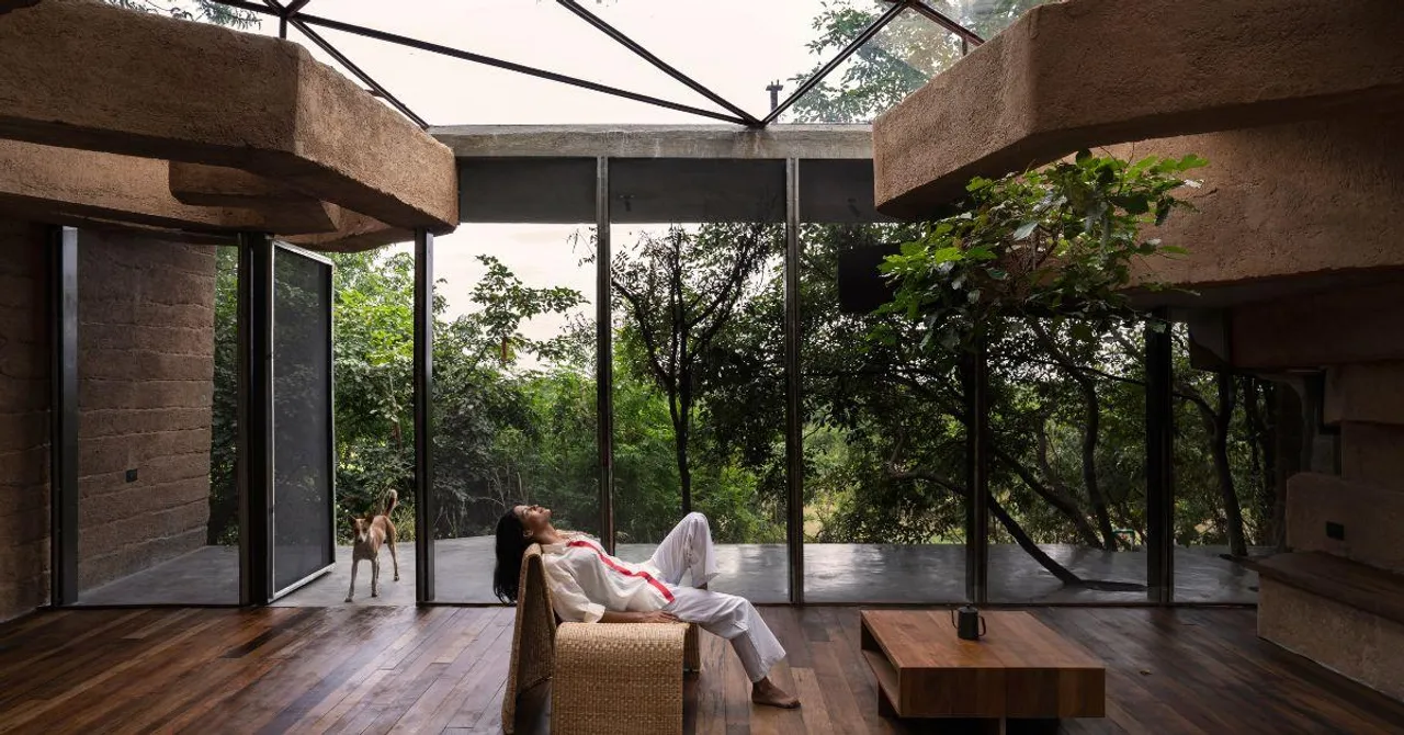 Built Amid a Canopy of Trees, This Sustainable Mud Home Is Made with 4000 Plastic Bottles