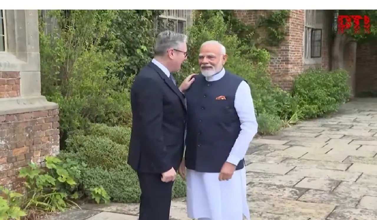 Narendra Modi and  Keir Starmer
