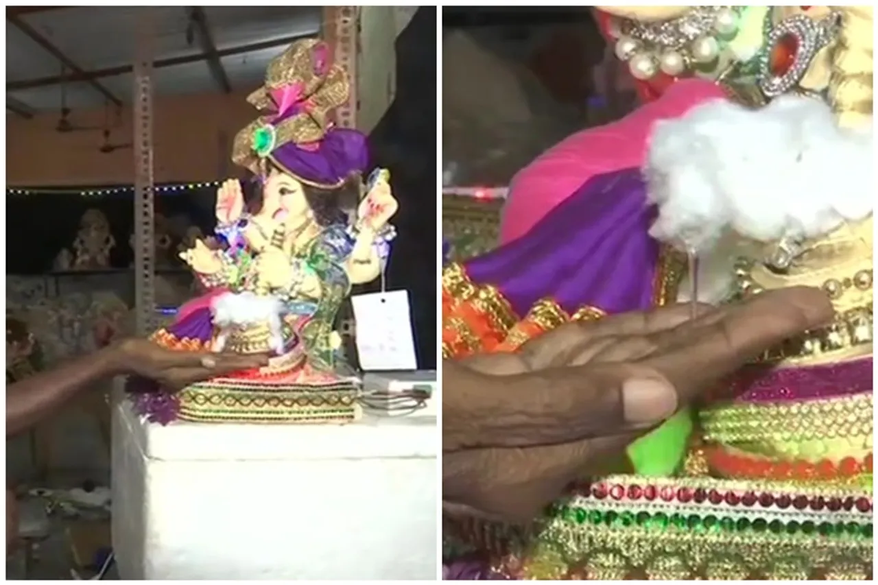 ganesh chaturthi 2020 ganeshotsav 2020 ganapati idol with sanitizer give sanitizer to your hands