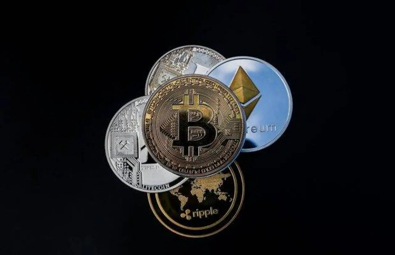 Bitcoin slips below $60,000 after record surge; Ethereum, other altcoins also see double-digit drop