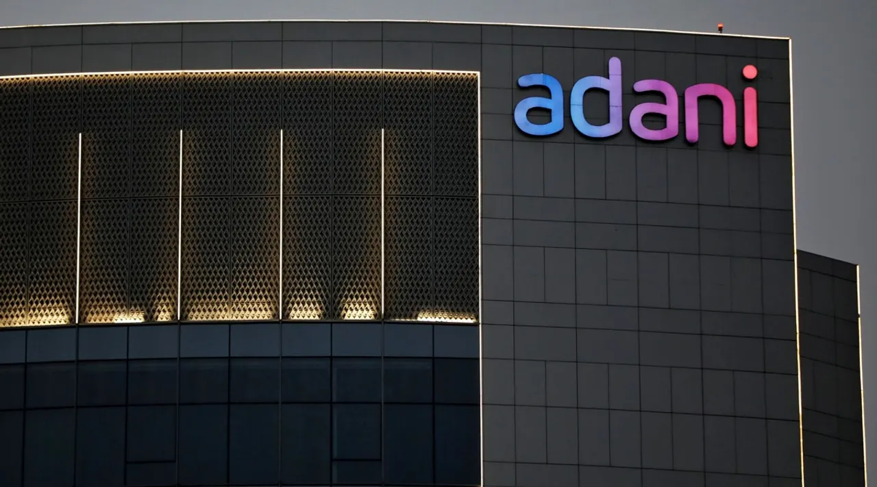 stock tips Adani Green Energy rallies 9 percent more than doubles investors money ytd what should you do