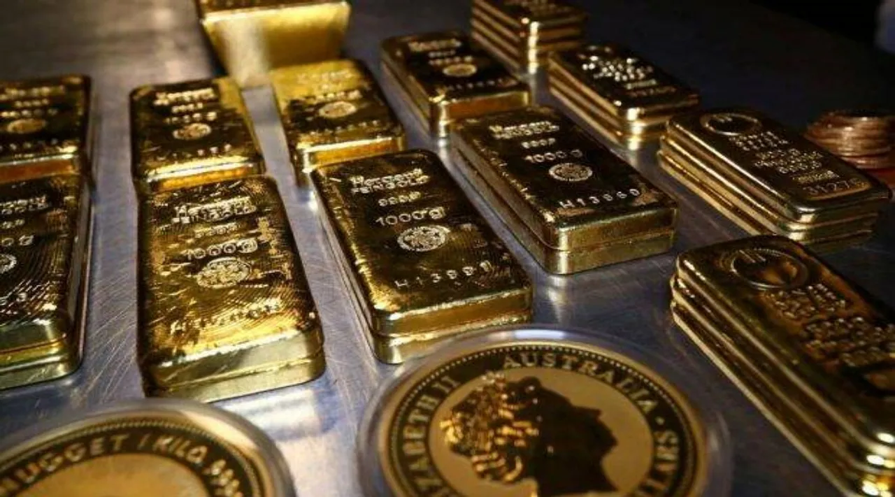 Gold gains marginally; silver slumps Rs 440