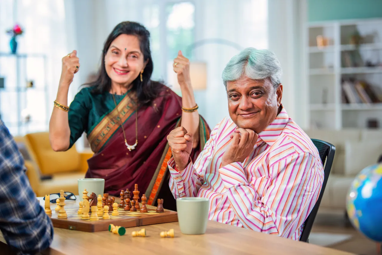 mature-indian-couple-enjoying-while-playing-chess-2025-01-16-12-49-51-utc (1)