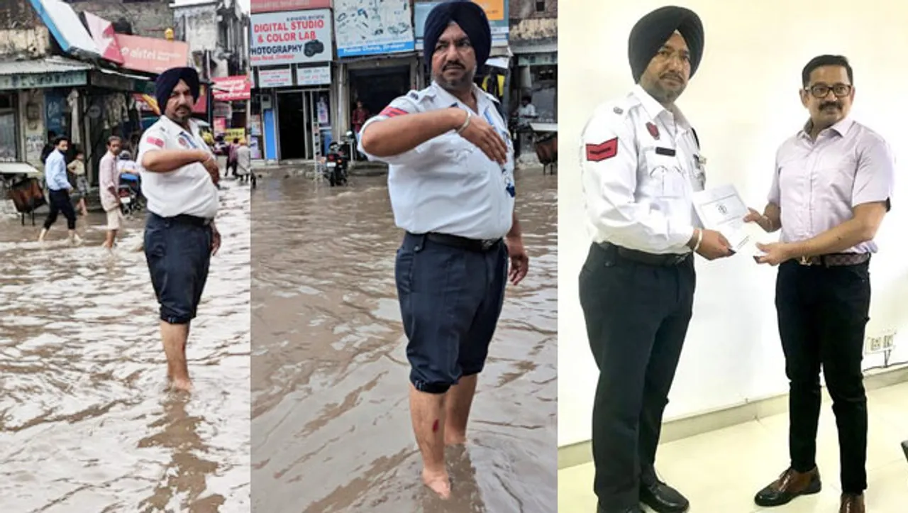 घुटनों तक भरा पानी भी पंजाब पुलिस को ड्यूटी करने से नहीं रोक पाया; मिला सीएम से इनाम!