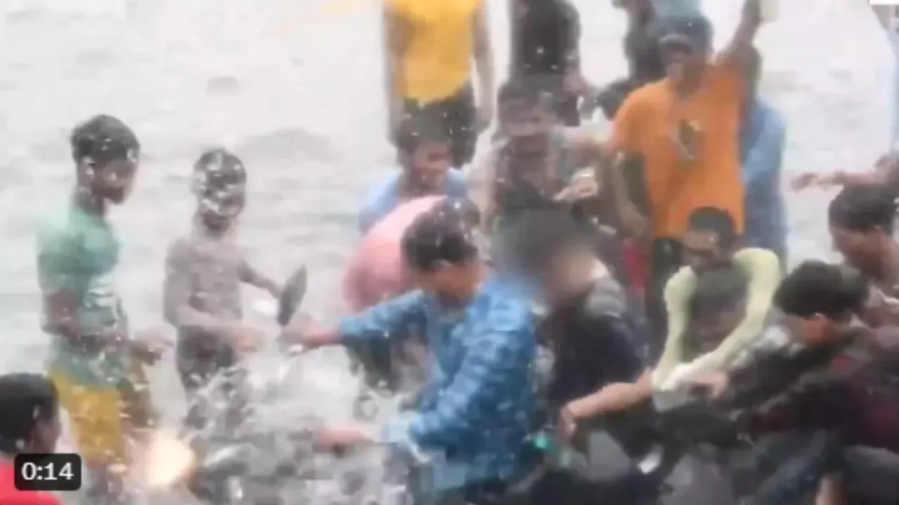 In Lucknow, boys having fun in the rain misbehaved with a woman