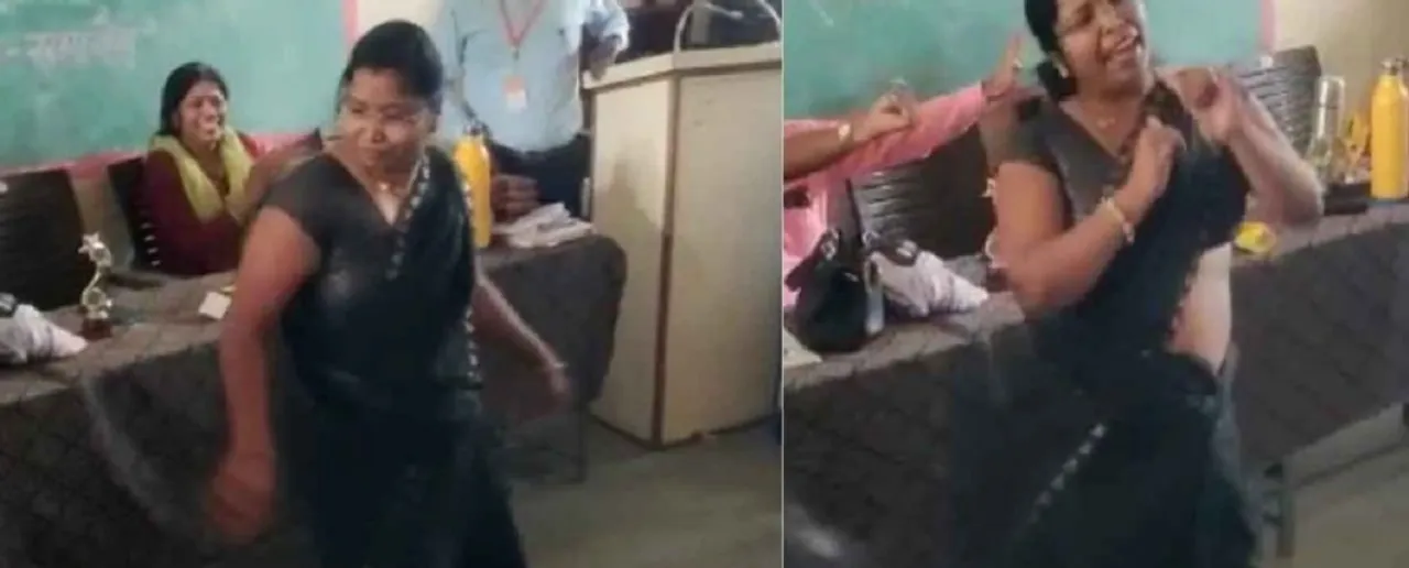 Teacher Dancing In A Classroom