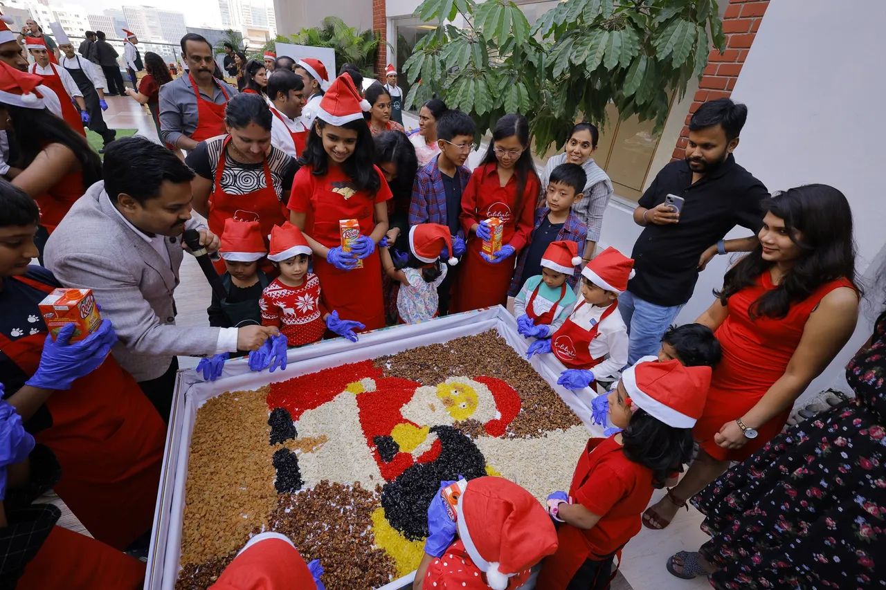 Children also joining in the mixing activity