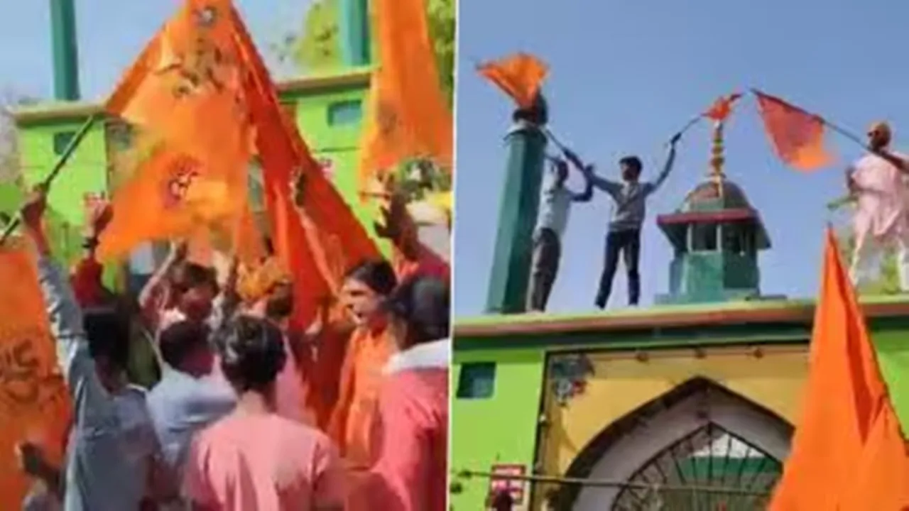 prayagraj hindu organization workers climbed-the dargah of salar masood ghazi hoisted the saffron flag