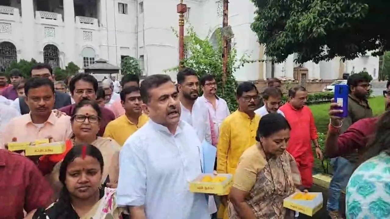 OBC case interim stay  ,Calcutta High Court OBC list,  140 sub-castes stay  ,OBC notification halted,  BJP laddoo distribution Assembly  ,Suvendu Adhikari laddoo celebration  ,BJP celebrates OBC stay,ওবিসি মামলায় স্থগিতাদেশ,  কলকাতা হাইকোর্ট ওবিসি তালিকা,  ১৪০ জনজাতি স্থগিতাদেশ  ,ওবিসি বিজ্ঞপ্তিতে হাইকোর্টের থাম,  বিধানসভার বাইরে লাড্ডু বিতরণ , শুভেন্দু অধিকারী লাড্ডু  ,বিজেপি উদযাপন ওবিসি