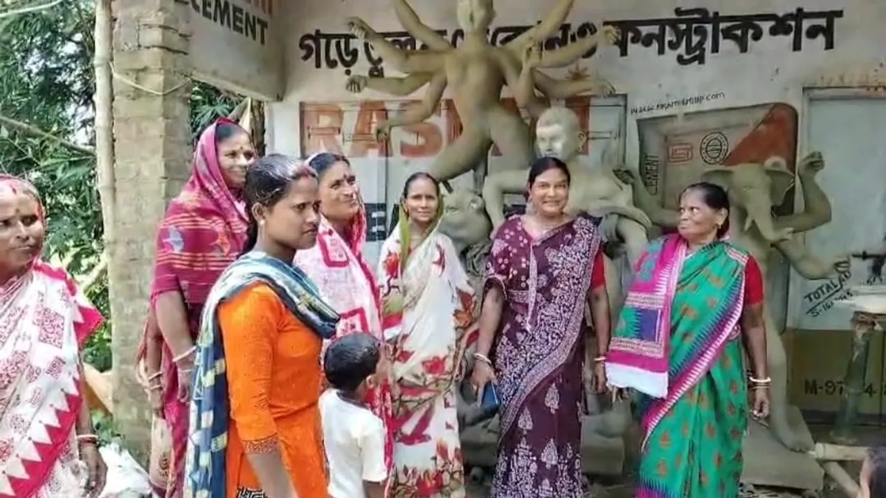 Dhurpa village  ,Matri Shakti Puja Committee,  Lakshmi Bhandar scheme  ,Third year Durga Puja,  Women-led initiative,  Puja donation  ,State government grant,  Rural Durga Puja organizing,Durga Puja 2025, ধুরপা গ্রাম  ,মাতৃ শক্তি পুজো কমিটি,  লক্ষ্মীর ভাণ্ডার  ,দুর্গাপূজা তৃতীয় বছর,  মহিলা উদ্যোগ  ,পুজোর চাঁদা,  রাজ্য সরকারের অনুদান,  গ্রামীণ পুজো আয়োজন