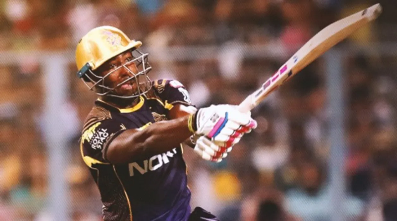 Andre Russell Plays With His Car-Shaped 'Super Striker' Award