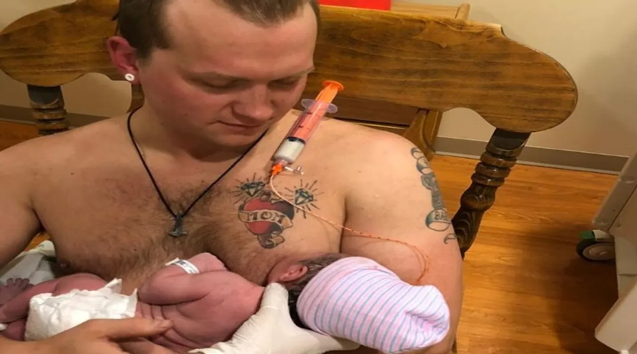 Dad breastfeeds newborn, সদ্যোজাতকে স্তন্যপান করালেন বাবা