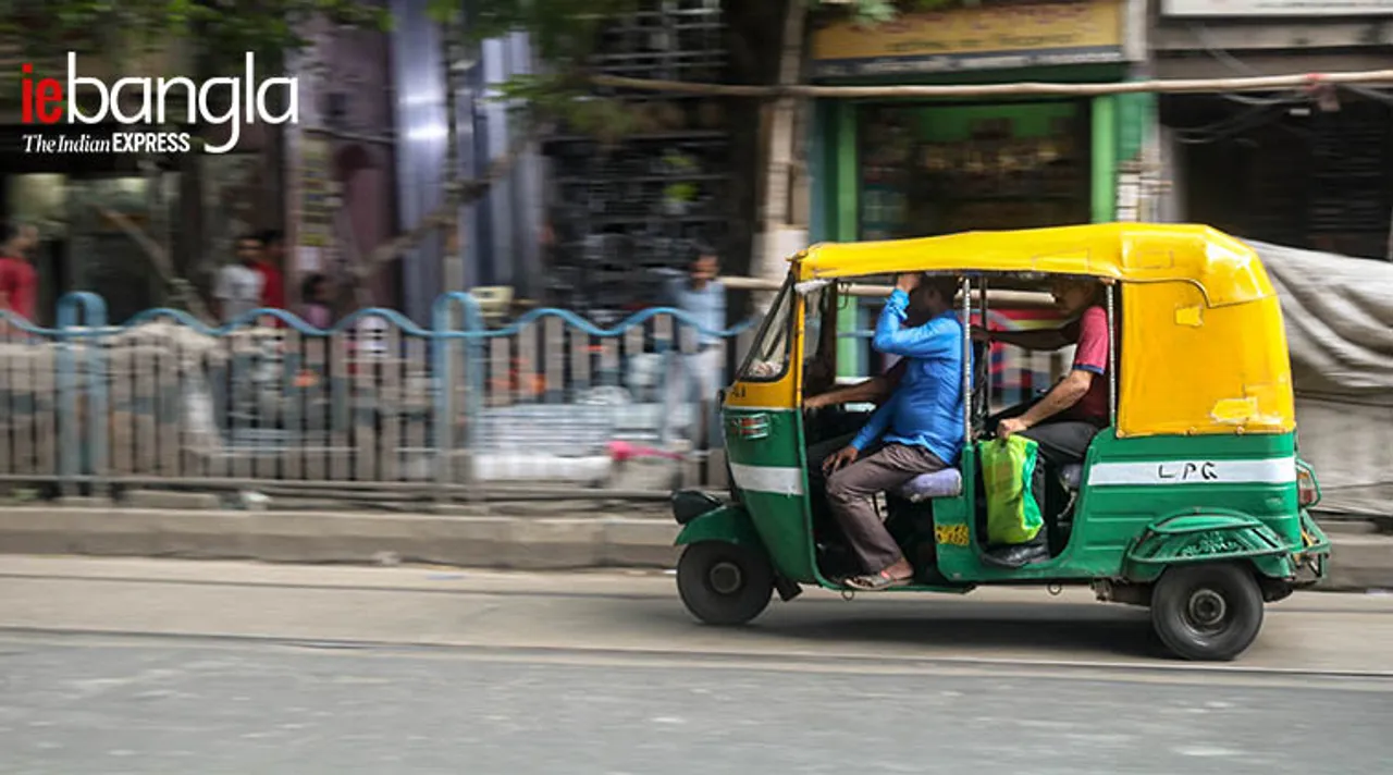 kolkata Auto Driver carrying extra passengers his beside Express Photo Shashi