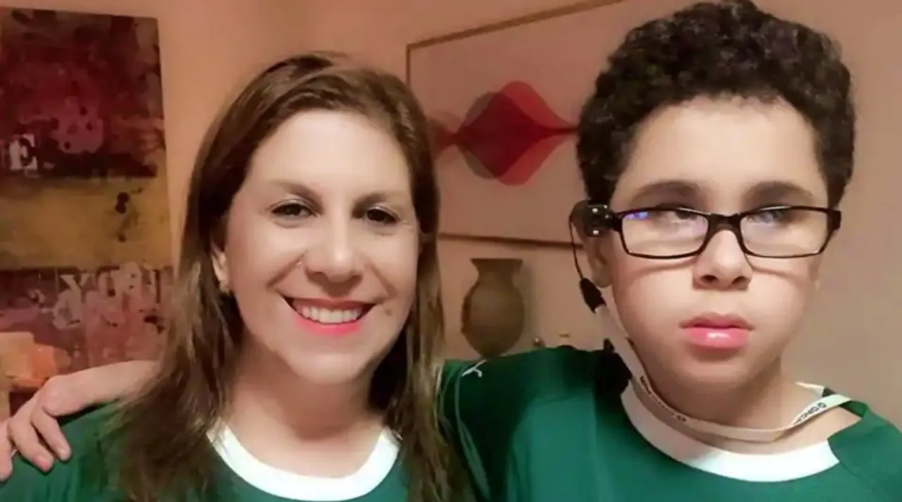 Brazil mom narrates football games for blind son. Internet hearts them