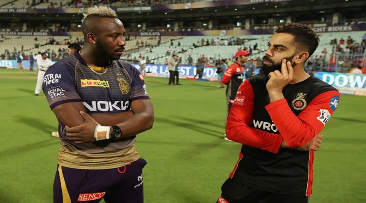 Andre Russell of Kolkata Knight Riders and Virat Kohli