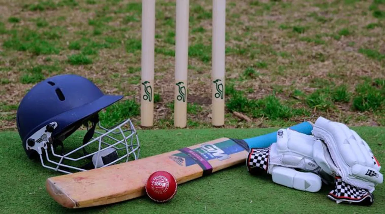 bat and ball and wicket