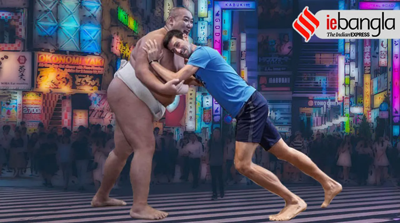 Novak Djokovic tries sumo wrestling