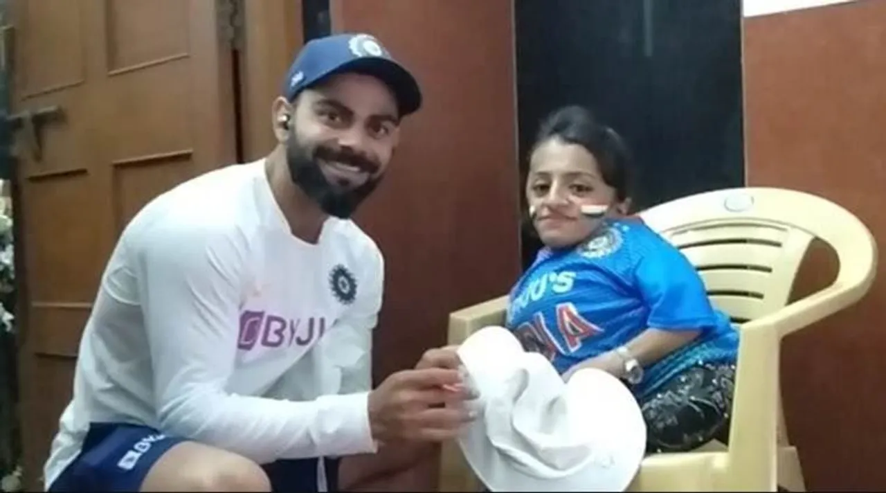 Virat Kohli with his fan