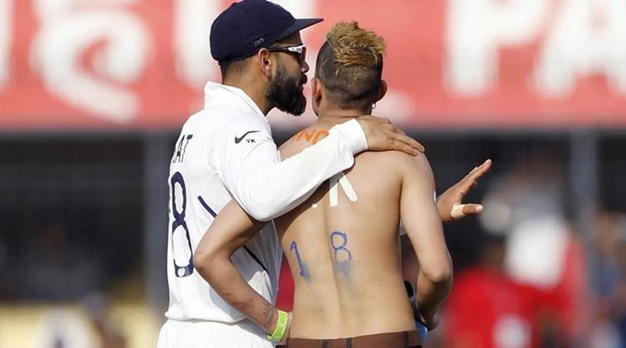Virat Kohli with his fan