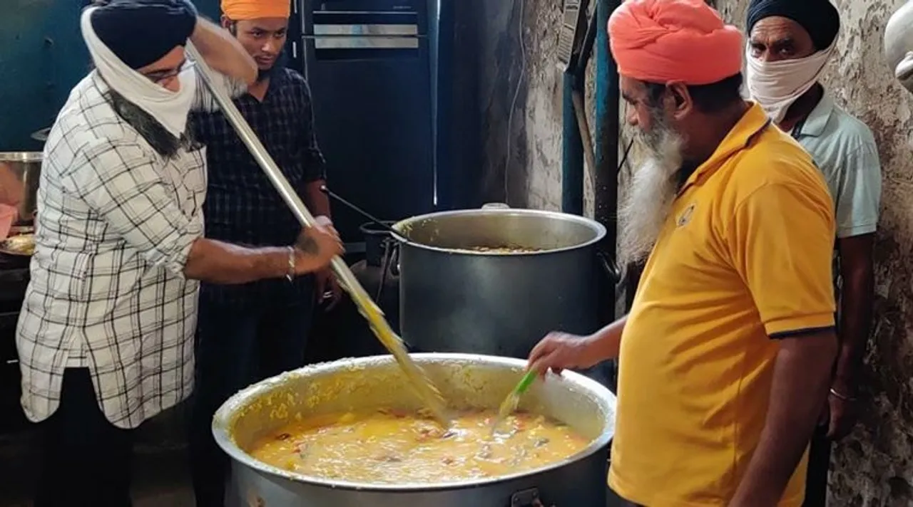 kolkata gurudwaras,কলকাতার গুরুদ্বার, লকডাউন, langars during lockdown, বেহালা গুরুদ্বার, behala gurudwara langer, needy poor langer kolkata, iha foundation, kolkata news, indian express bangla