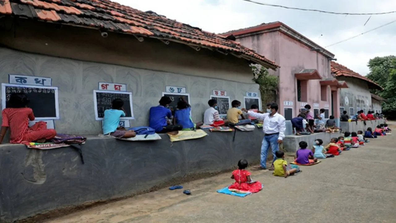 In remote village, teacher turns walls into blackboards