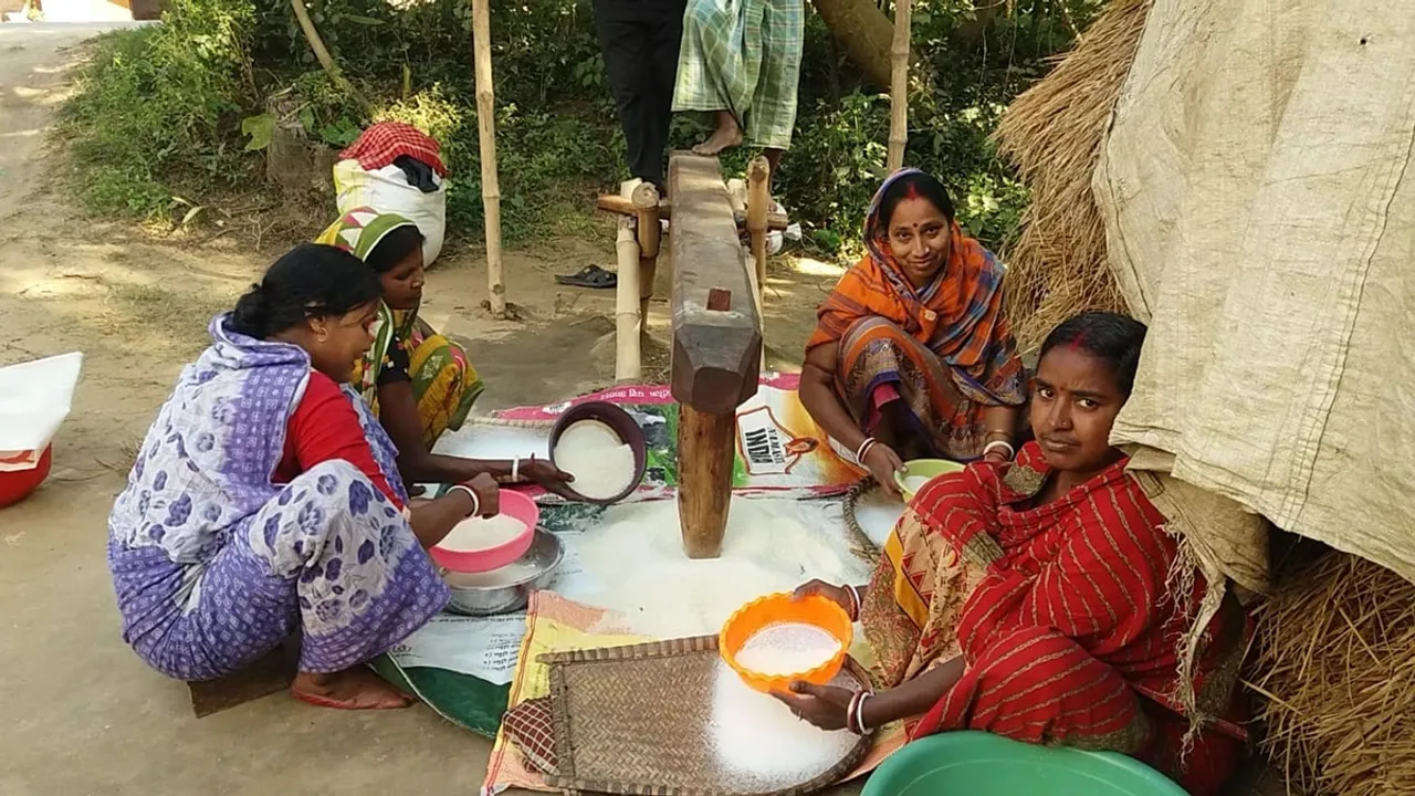 Dhenki is still relied on in several villages of Jamalpur in East Burdwan to cut rice for Pithe-Puli