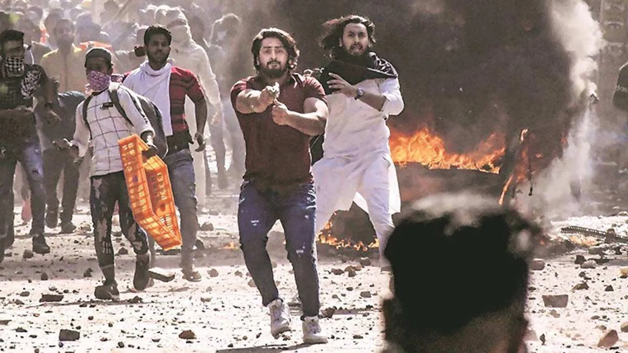 Delhi riots accused who pointed gun at cop gets big welcome while on parole