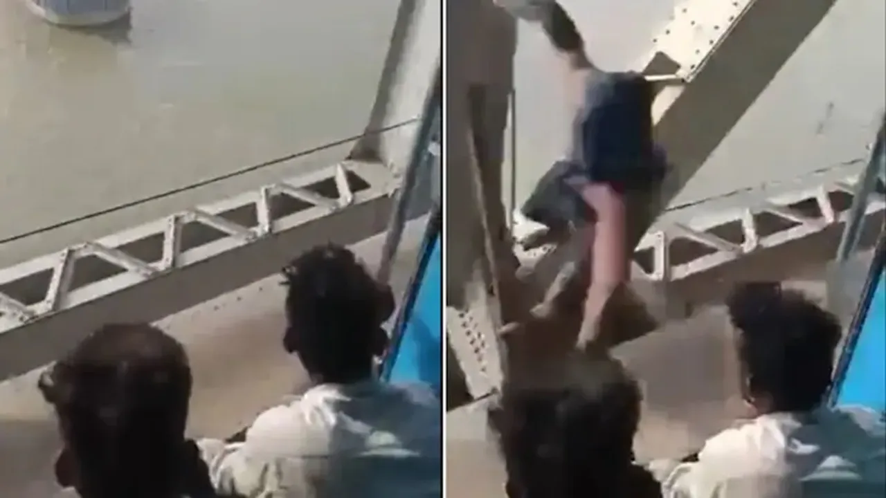man snatches phone, theif snatches phone, moving train theif snatches phone