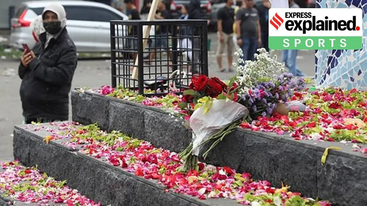Flowers are laid by supporters of Arema FC outside Kanjuruhan Stadium. where riots broke out on Saturday night in Malang, East Java, Indonesia, on October 2